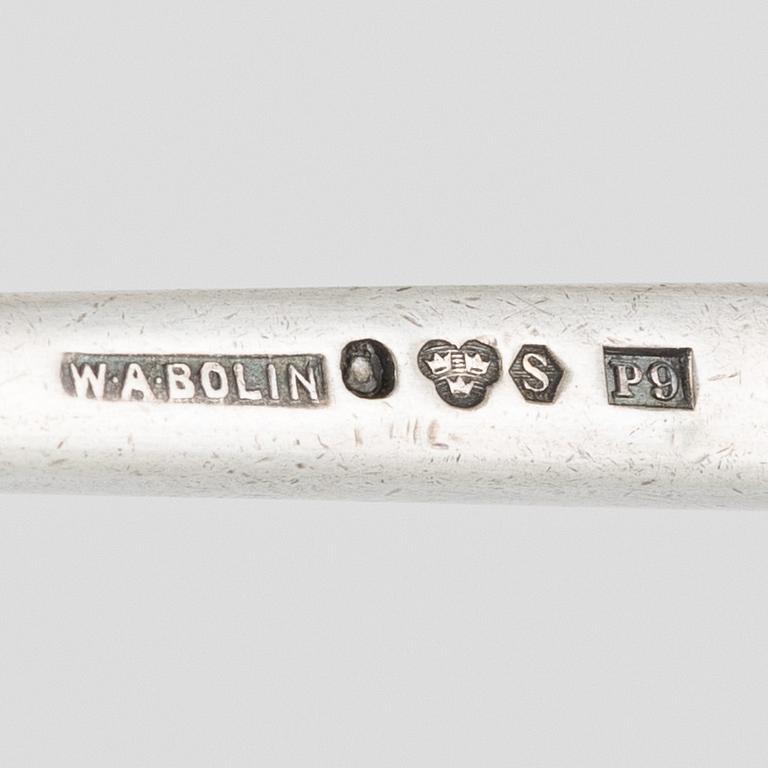 A silver honey spoon designed by Barbro Littmarck for W.A Bolin, Stockholm 1965.