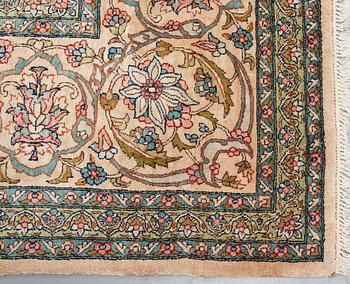 A CARPET, an old silk Turkey, ca 428 x 299-307 cm.