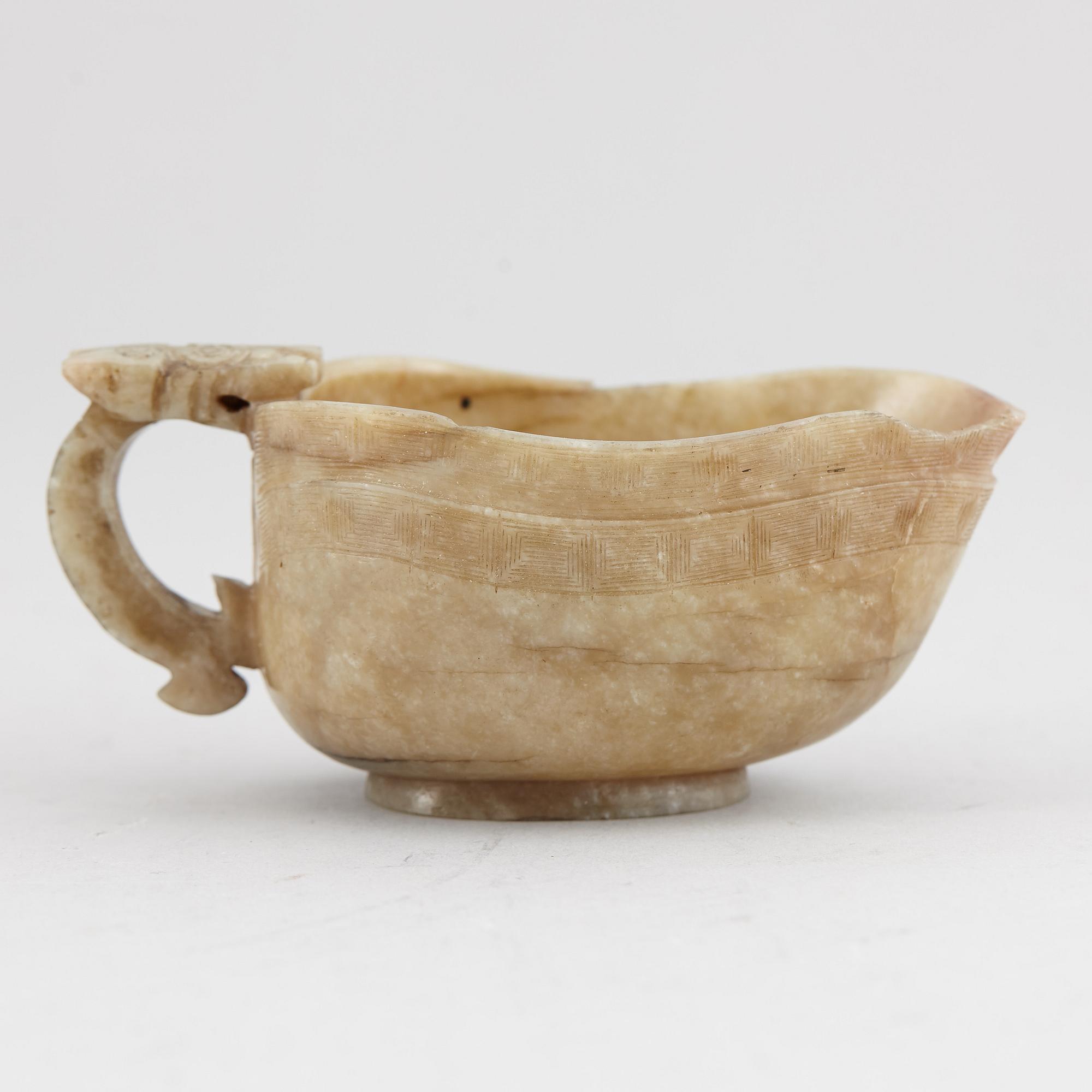 A group of three nephrite objects, Qing dynasty.