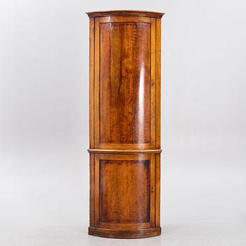 A Swedish Corner Cabinet, first half of the 19th Century.