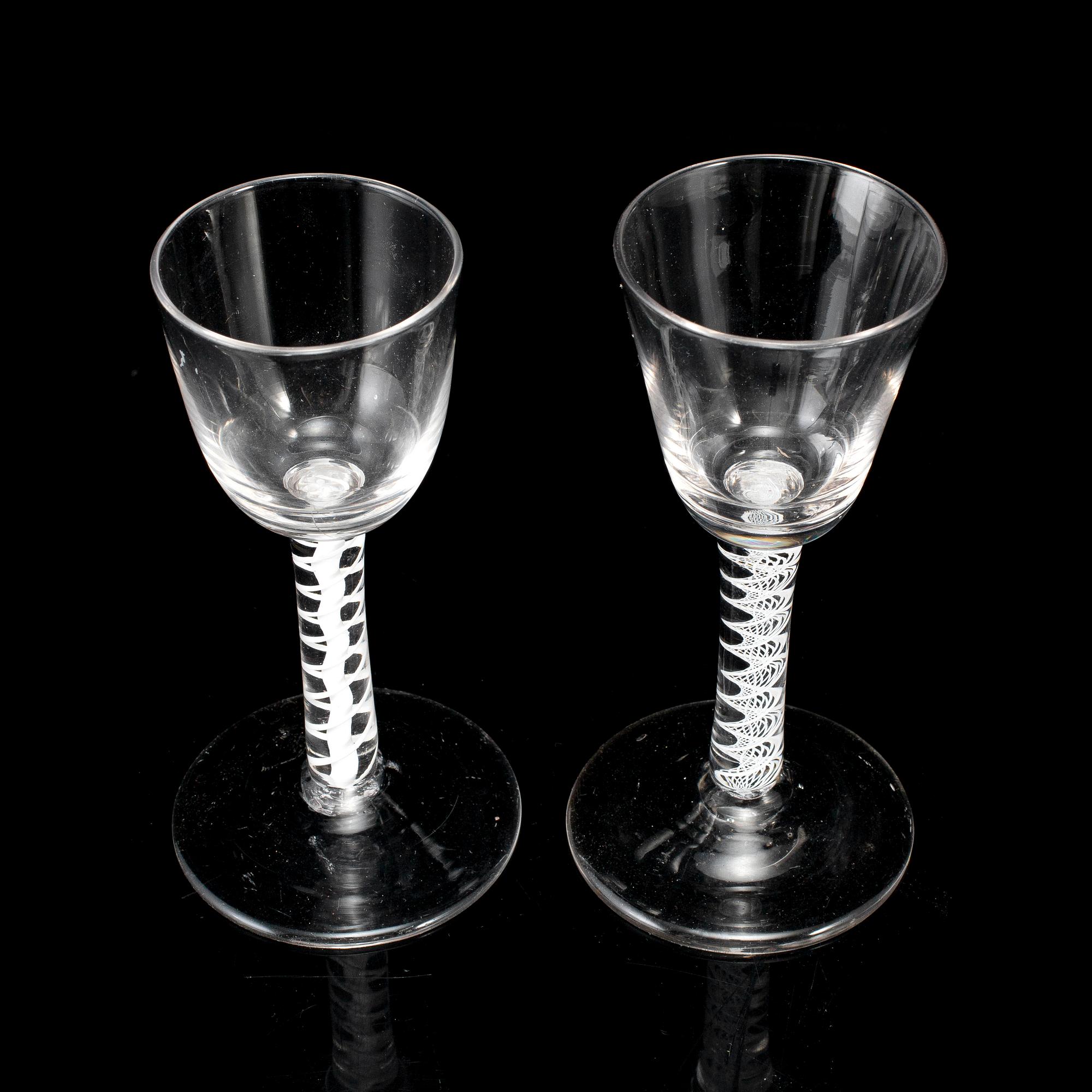 Two 18th century wine glasses.