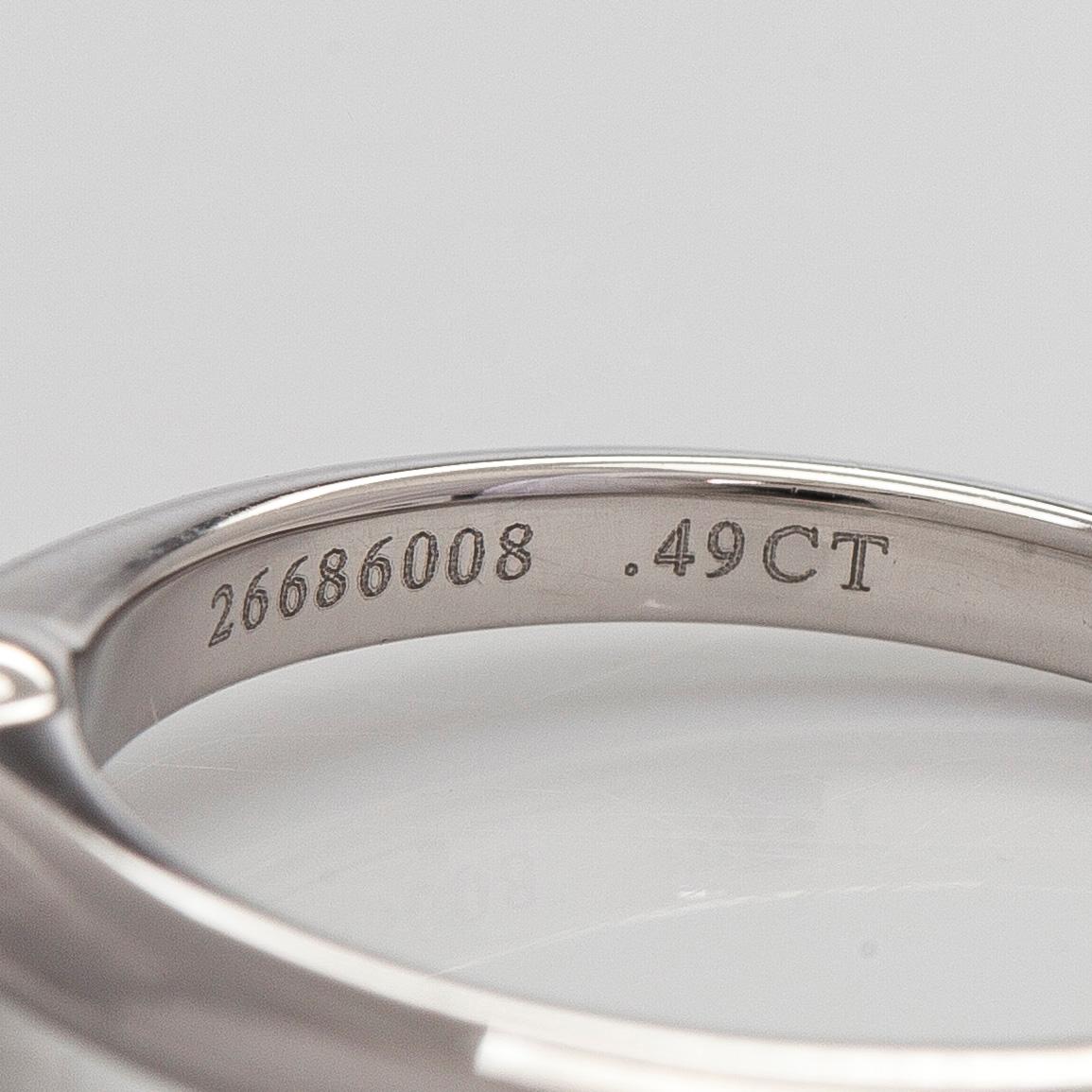Tiffany & Co, a platinum solitaire ring with a brilliant-cut diamond.