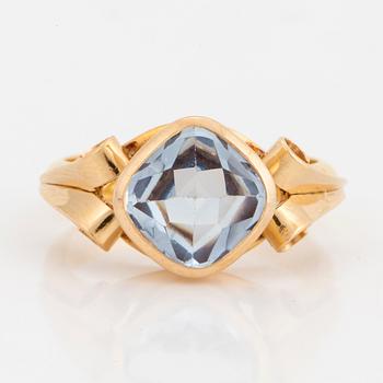 A synthetic blue spinel ring.