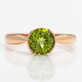 Ring, 18K guld och peridot. Kultateollisuus, Åbo 1917.