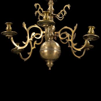 A baroque brass chandelier, first half of 18th century. Height (ink chain) 70 cm.