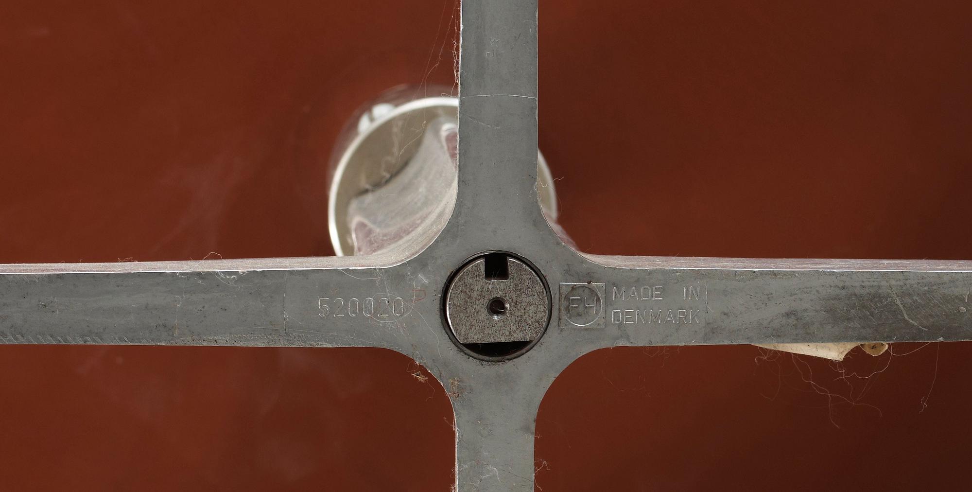 A pair of Arne Jacobsen brown leather 'Swan' chairs, Fritz Hansen, Denmark 1972.