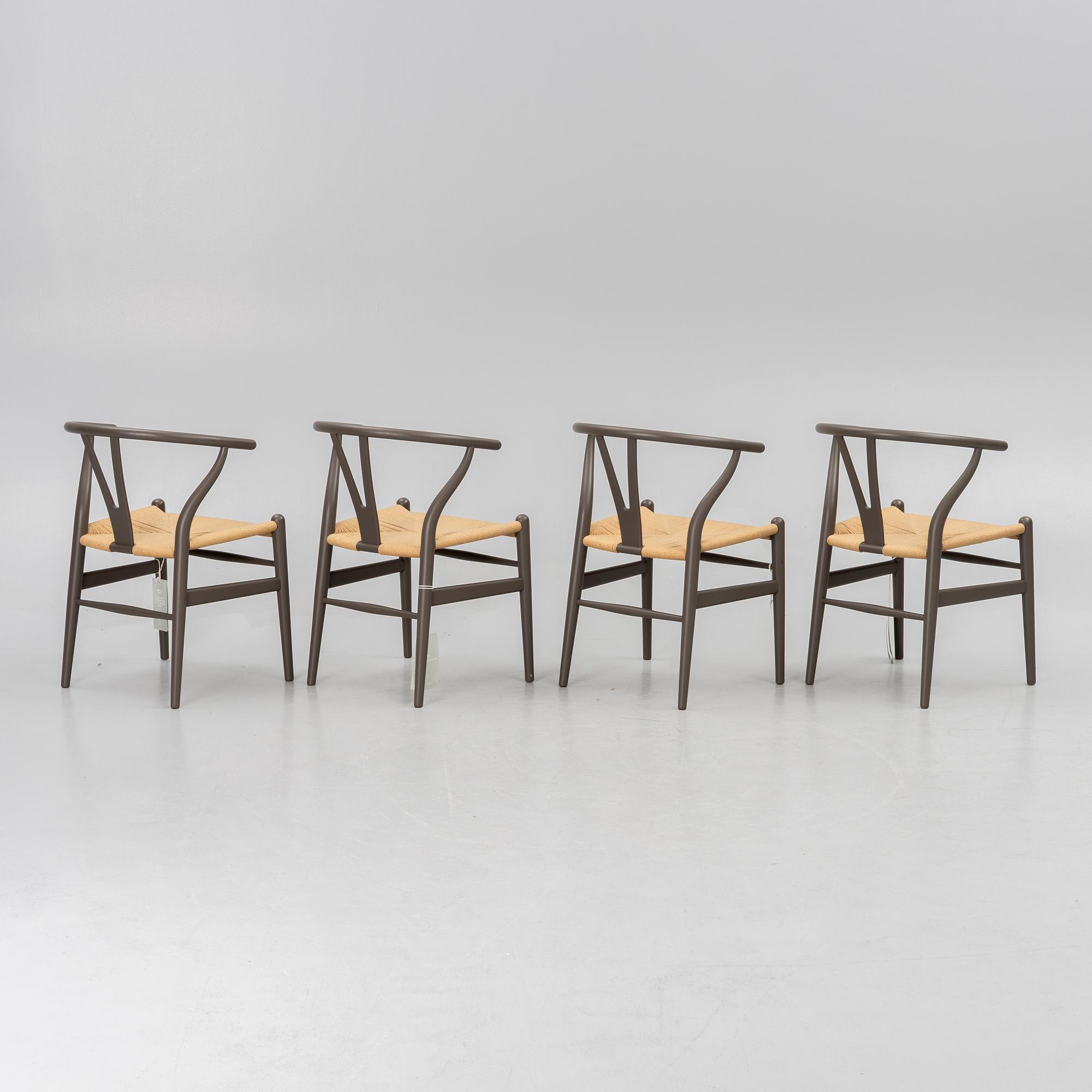Hans J. Wegner, four CH 24 chairs, Carl Hansen & Son, Denmark.