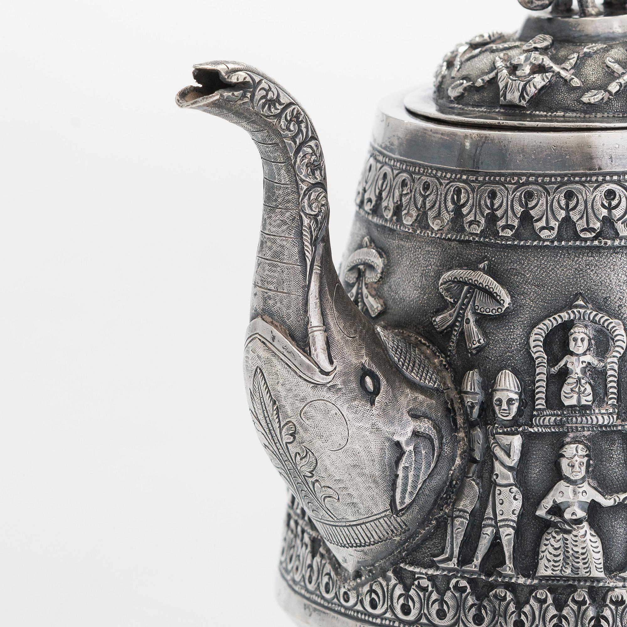 An Indian silver teapot.