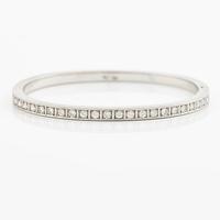 Armband/armring, 18K vitguld med briljantslipade diamanter.