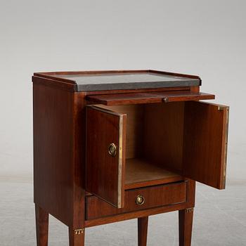 A pair of mahgany veneered bedside cabinets, early 20th Century.