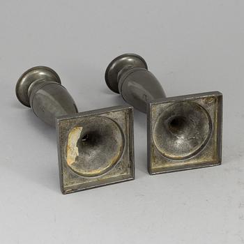 A pair  biedermeier pewter candlesticks, 19th century.
