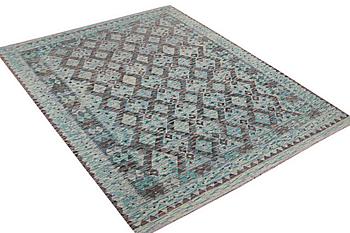 A Kilim rug, c. 250 x 194 cm.