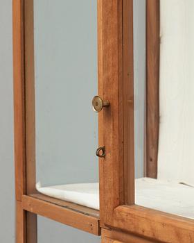 A Josef Frank mahogany showcase cabinet, a version of model 2077, by Svenskt Tenn.