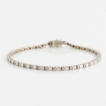 An 18K white gold Chimento bracelet set with round brilliant-cut diamonds.