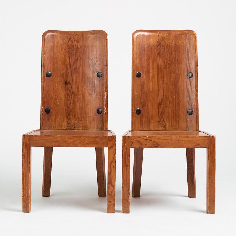 Axel Einar Hjorth, a pair of stained pine 'Lovö' chairs, Nordiska Kompaniet, Sweden 1930s.