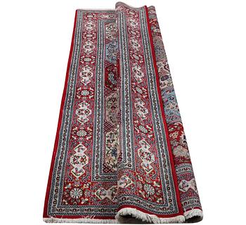 An oriental carpet, c. 250 x 150 cm.