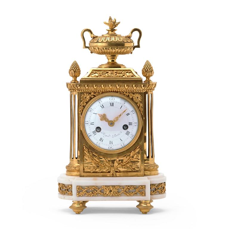 A Louis XVI circa 1780 mantel clock.