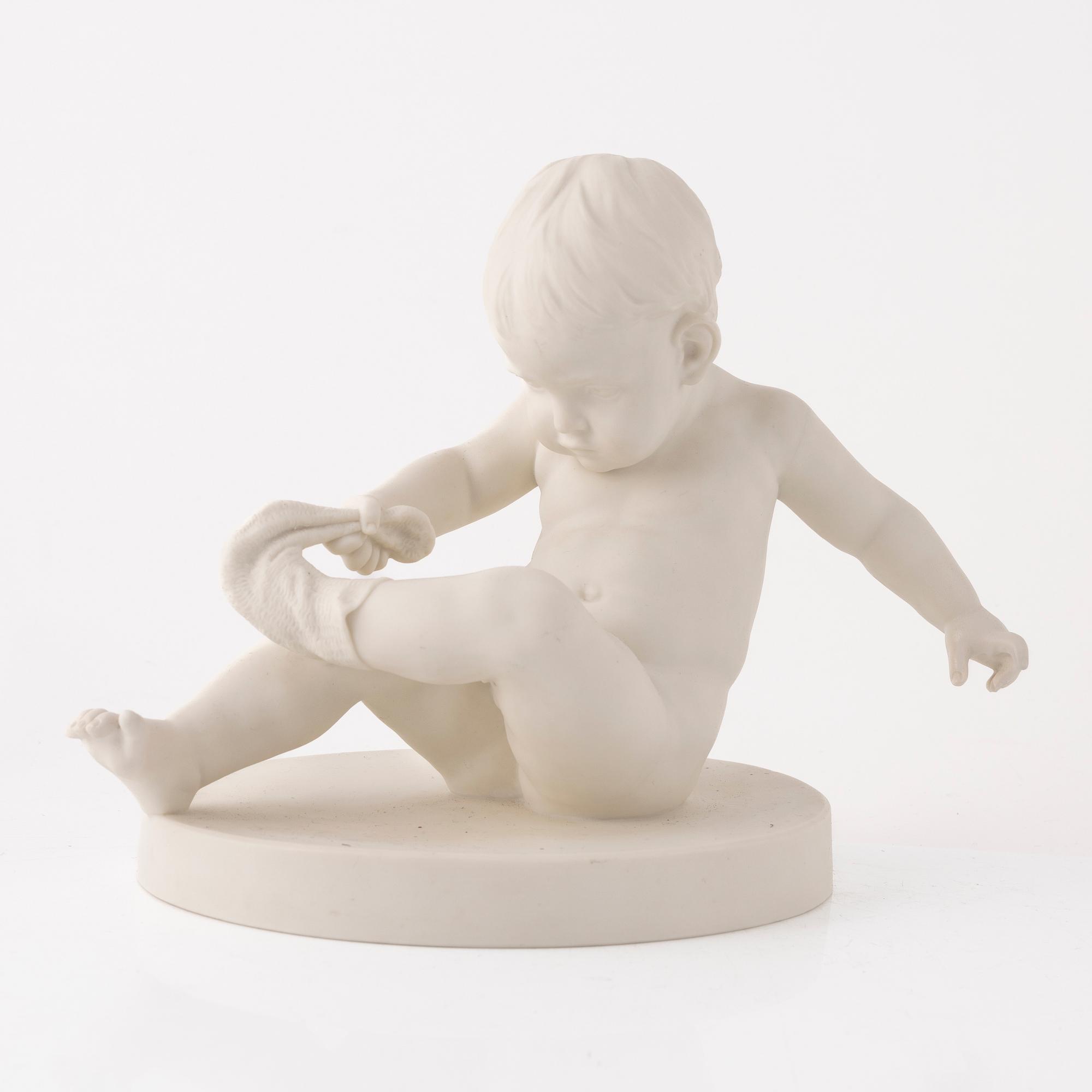 A group of three figurines, Gustafsberg, early 20th Century.