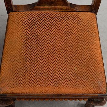 A 1920's 7 piece Chippendale-style dining group.