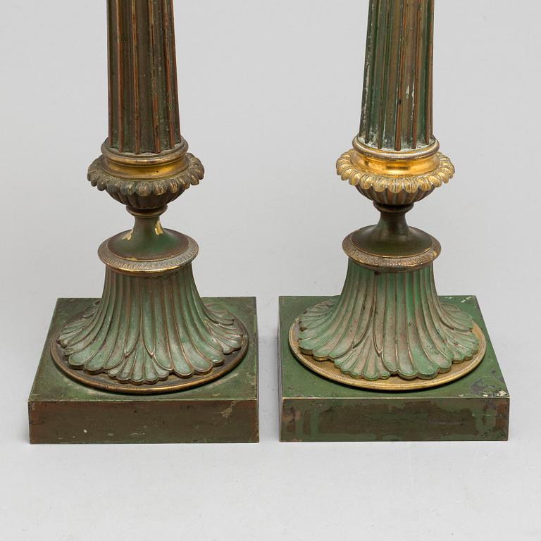 A pair of bronze gustavian candlesticks, late 18th century.