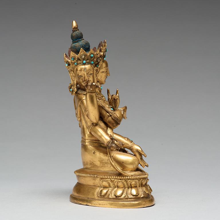 A Sino-Tibetan gilt copper alloy figure of Ushnisha Vinaya, late 18th century/circa 1800.