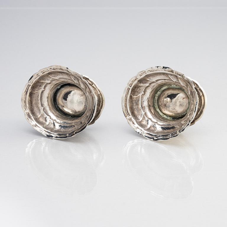 A pair of European Rococo 18th century silver salt-cellars.