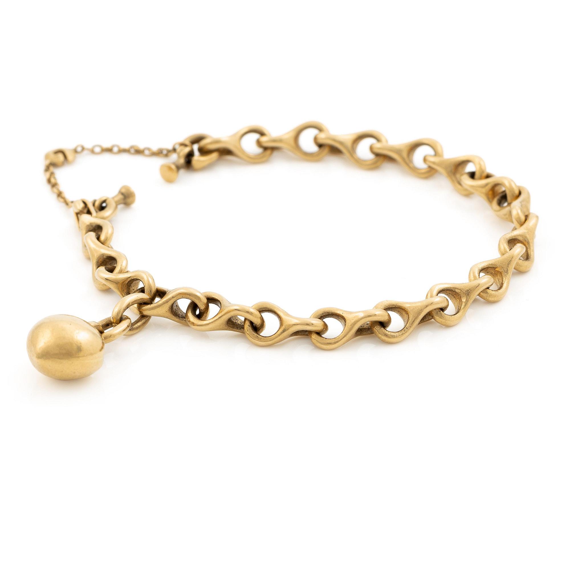An Ole Lynggaard bracelet 18K gold with heart charm.