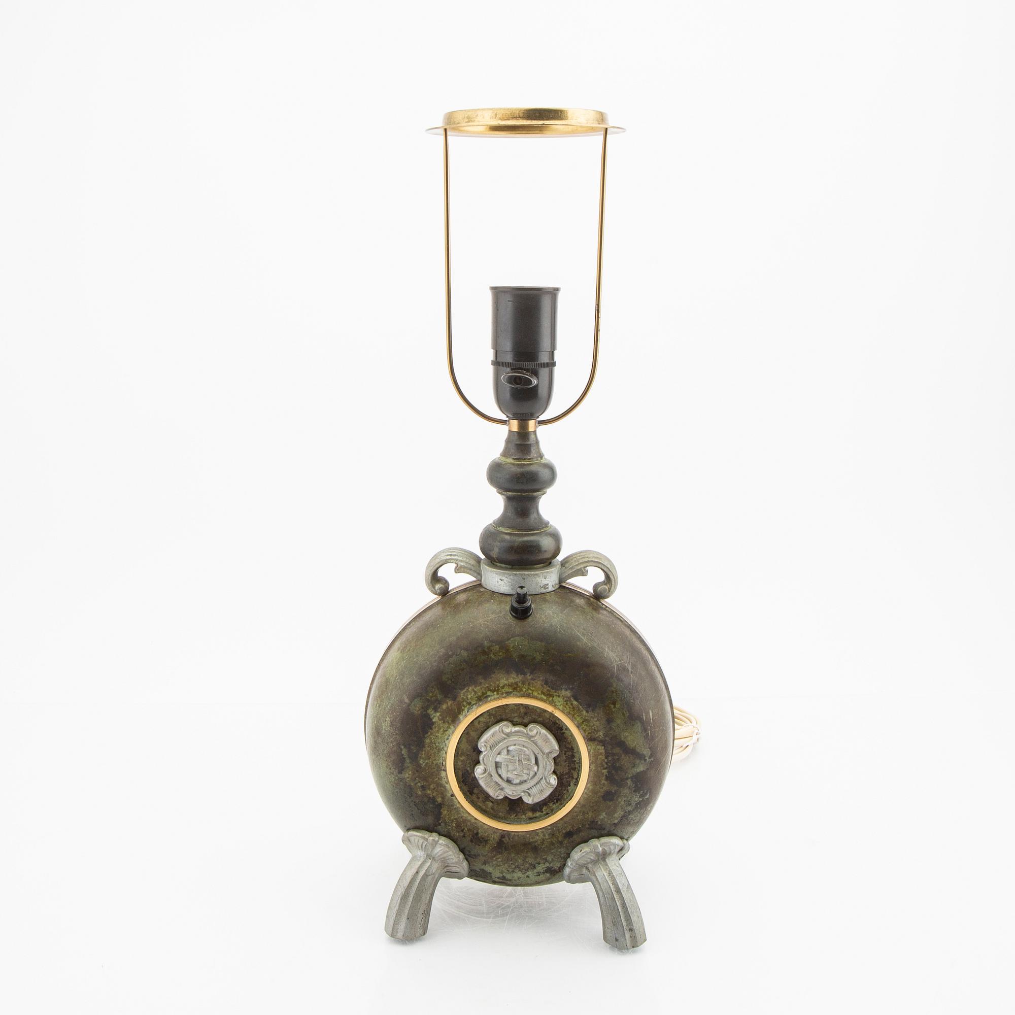 A 1940s metal table lamp.