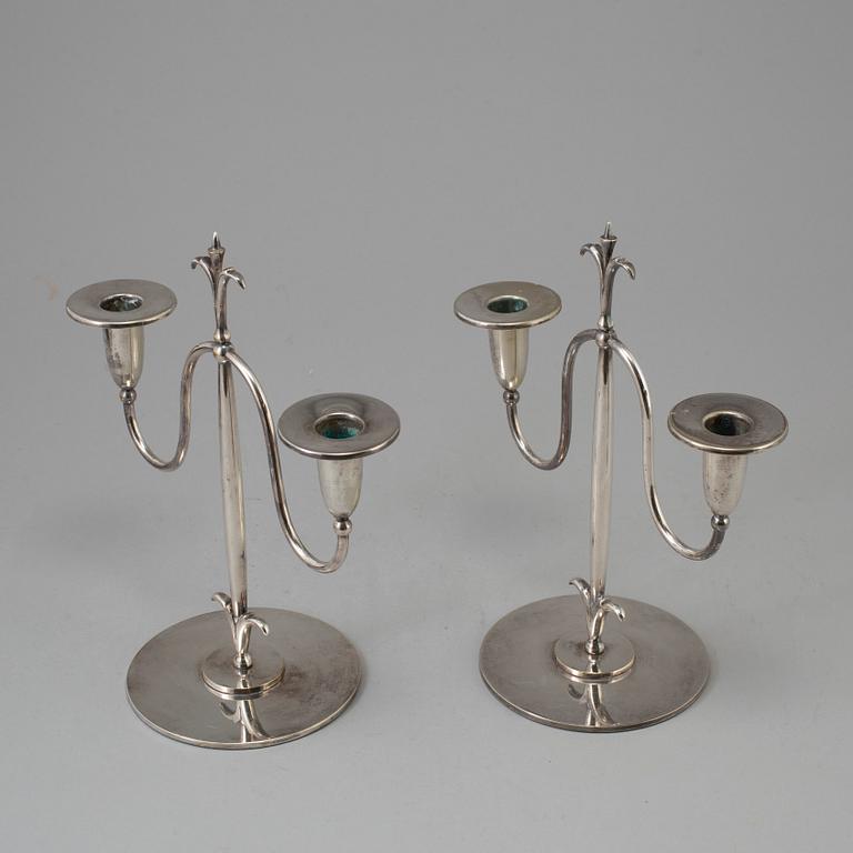 a pair of Elis Bergh silver plated candelabras, Swedish grace, CG Hallberg, Stockholm, 1920s.