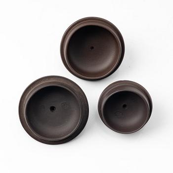 A group of four Chinese brown yixing teapots, 1980/90s.