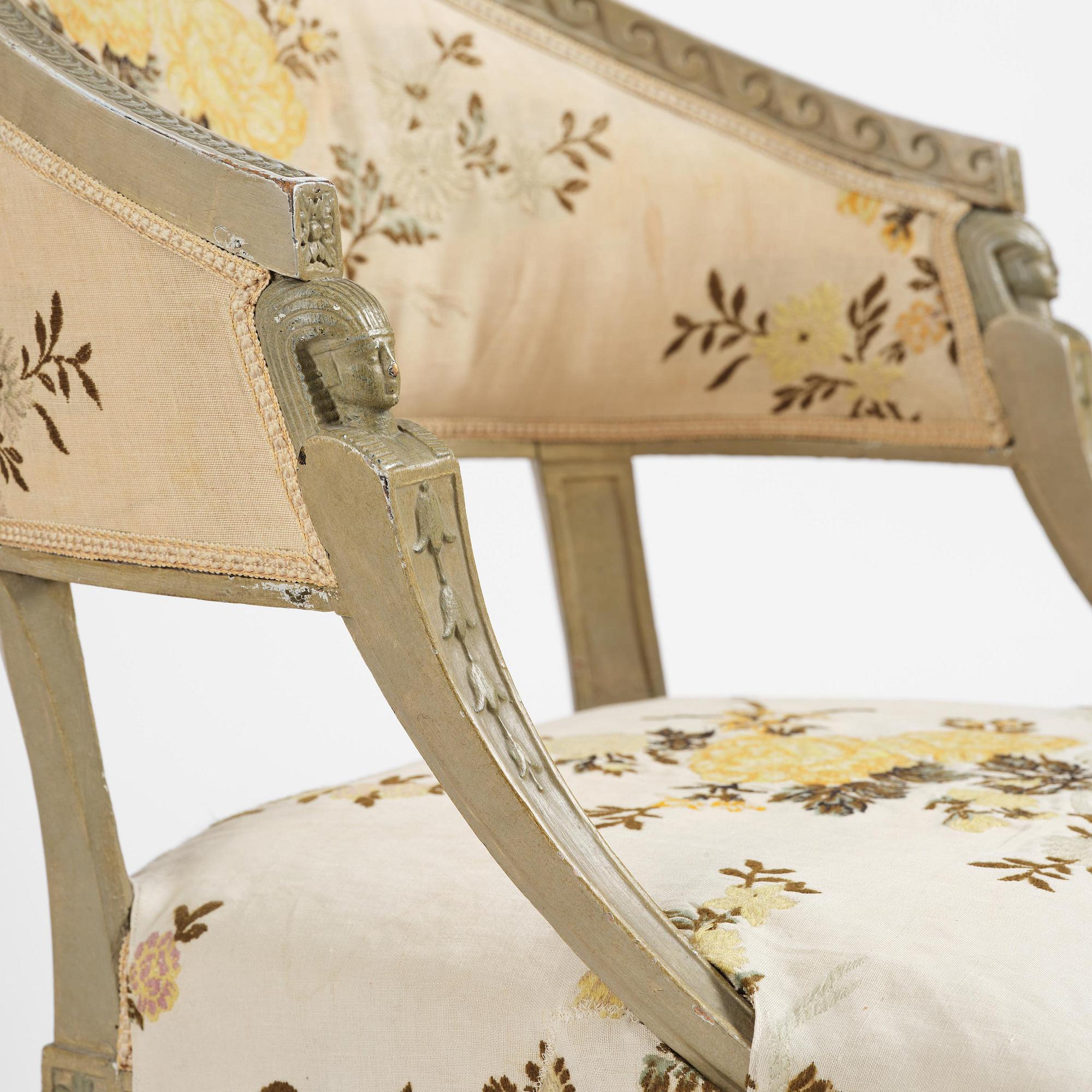 A pair of late Gustavian open-back armchairs attributed to E. Ståhl (master in Stockholm 1794-1820).
