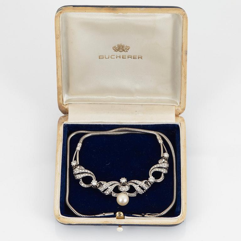A NECKLACE set with round brilliant-cut diamonds and cultured pearls.