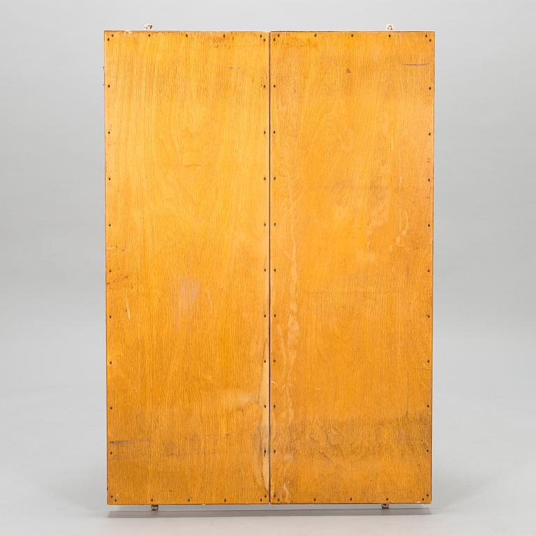 A 1950s three-part dressing mirror.