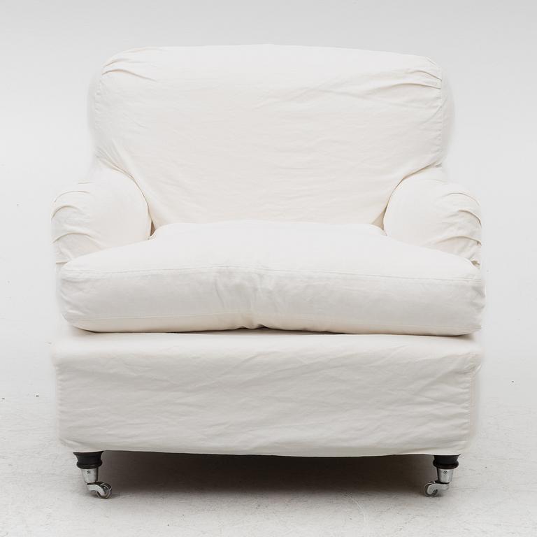 A Howard model armchair, contemporary.