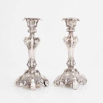 A Pair of Swedish Rococo-Revival Silver Candlesticks, Gustaf Möllenborg, Stockholm 1843-46.