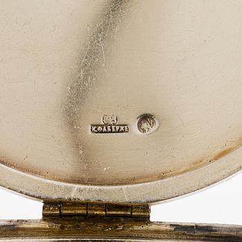 K. Fabergé, a silver sugar bowl and cream jug, Imperial Warrant mark, Moscow ca. 1913.