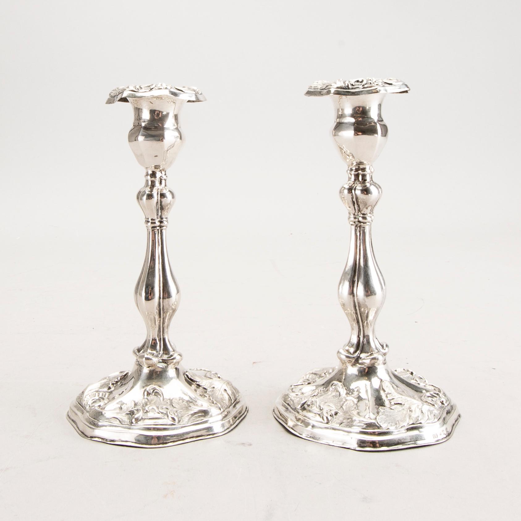 A 19th century pair of silver candle sticks mark of Oskar Närman Mariestad 1877.