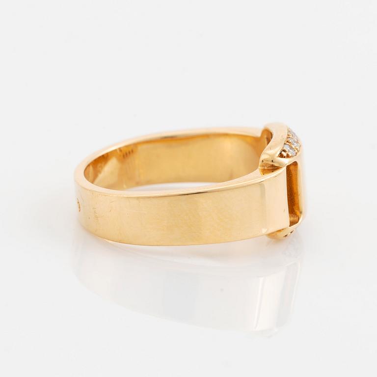 Hermès 18K gold ring set with round and brilliant-cut diamonds.