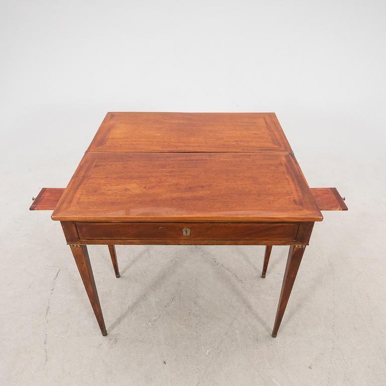 A late Gustavian mahogany game table first half of the 19th century.