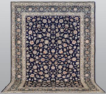 A Keshan carpet, approx. 418 x 311 cm.