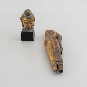 Two Thai gilt wooden fragments of figurines, late 19th century.