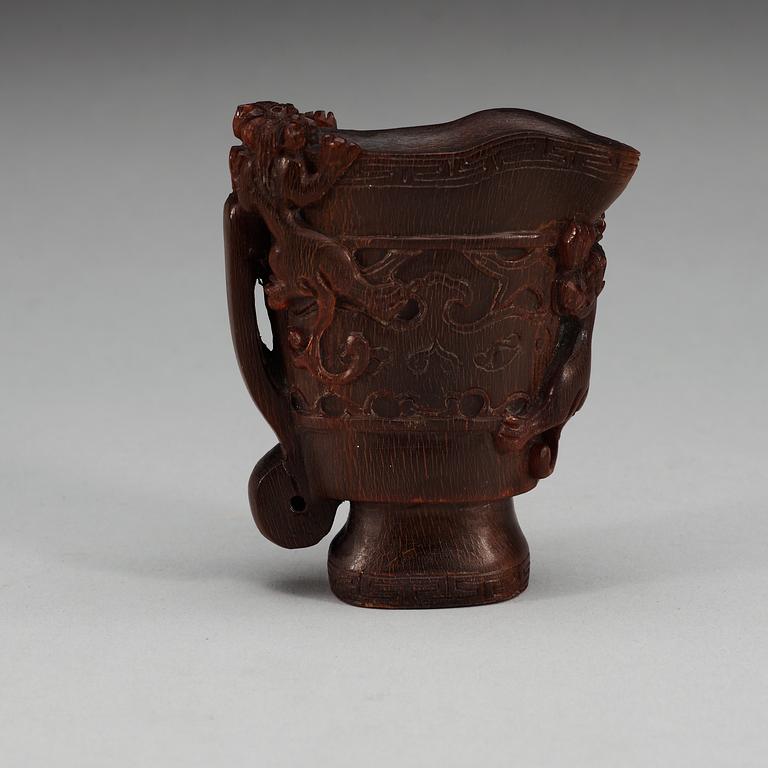 A rhinoserous libation cup, late Qing dynasty.