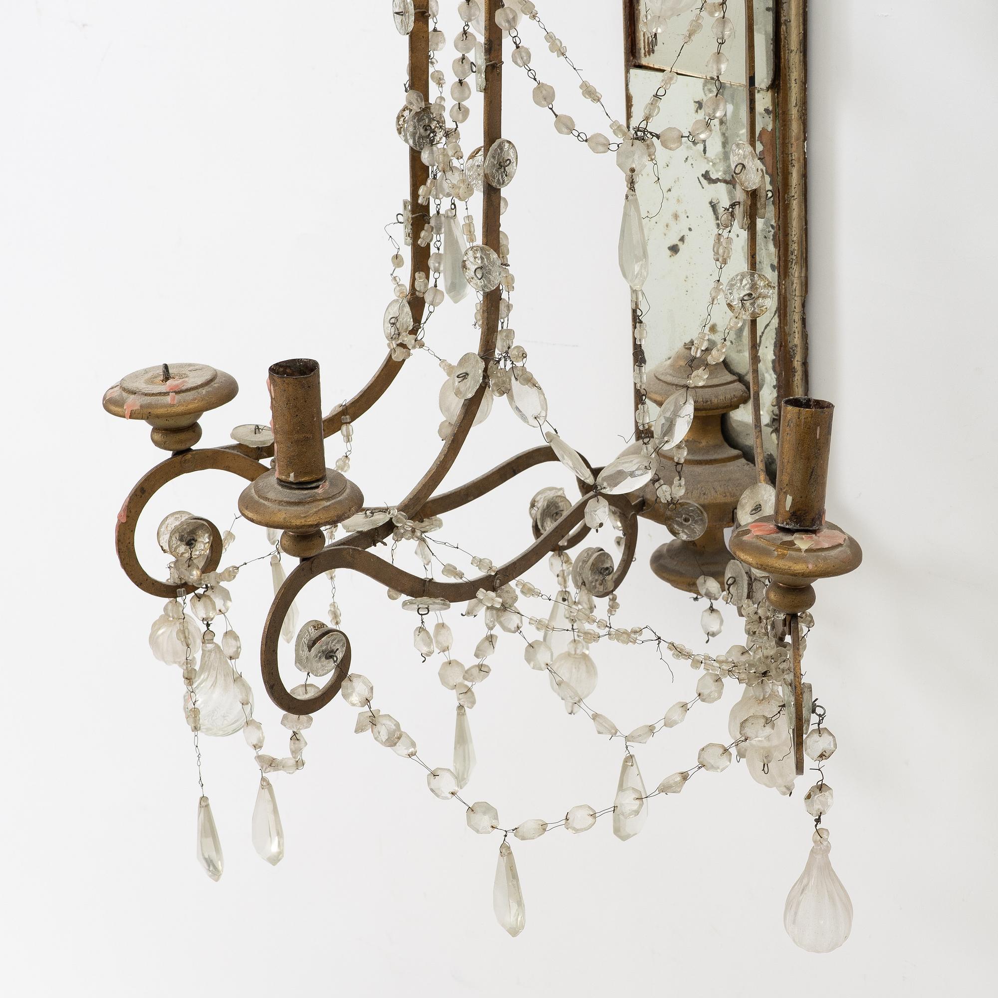 A pair of mirror wall sconces, second half of the 20th Century.