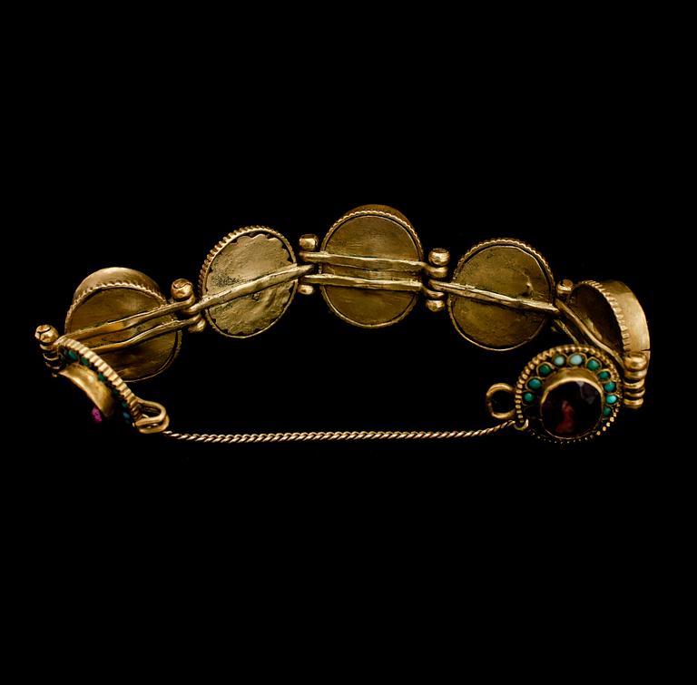 ARMBAND, mässing och turkoser, 1900-talets första hälft.