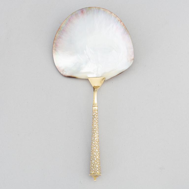 A silver and mother of pearl serving spoon, P. Hertz, Copenhagen, Denmark, 1885.