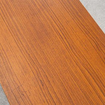 A 1950's teak veneered sideboard.