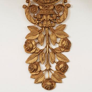 A pair of French 19th century gilt bronze five-light wall-lights.