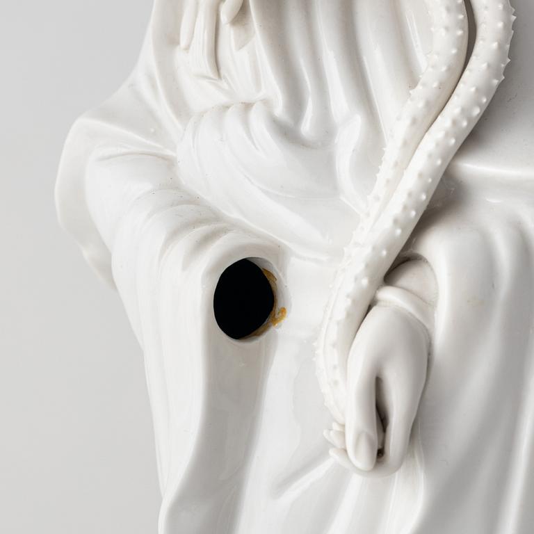 A Chinese bland cde Chine figure of a Guanyin, 20th century.