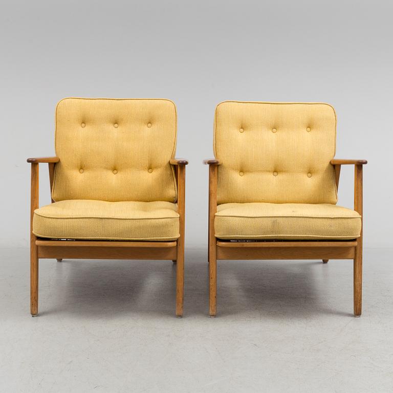 A pair of oak and teak 'Esbjerg' easy chairs from IKEA, 1950's/60's.