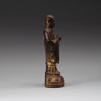 A bronze figure of a Lohan, Ming dynasty, 17th Century.